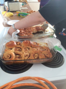 Samantha perfumed the air with the delicious smell of baking cinnamon buns